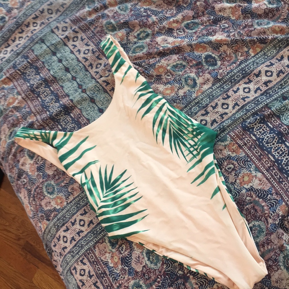 Never worn one piece